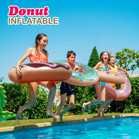 4E's Novelty donut pool float with yellow frosting adds cheerful vibes to lakeside gatherings.