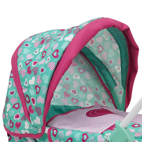 509 Mint Heart Daisy pram folded compactly for storage or travel