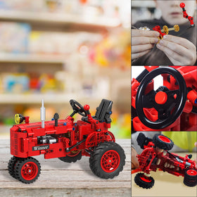A XINAO TOYS Classic tractor-building in action demonstrates hands-on learning.