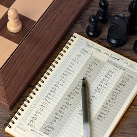 A&A chess scorebook inside pages lay flat for easy note-taking and move recording.