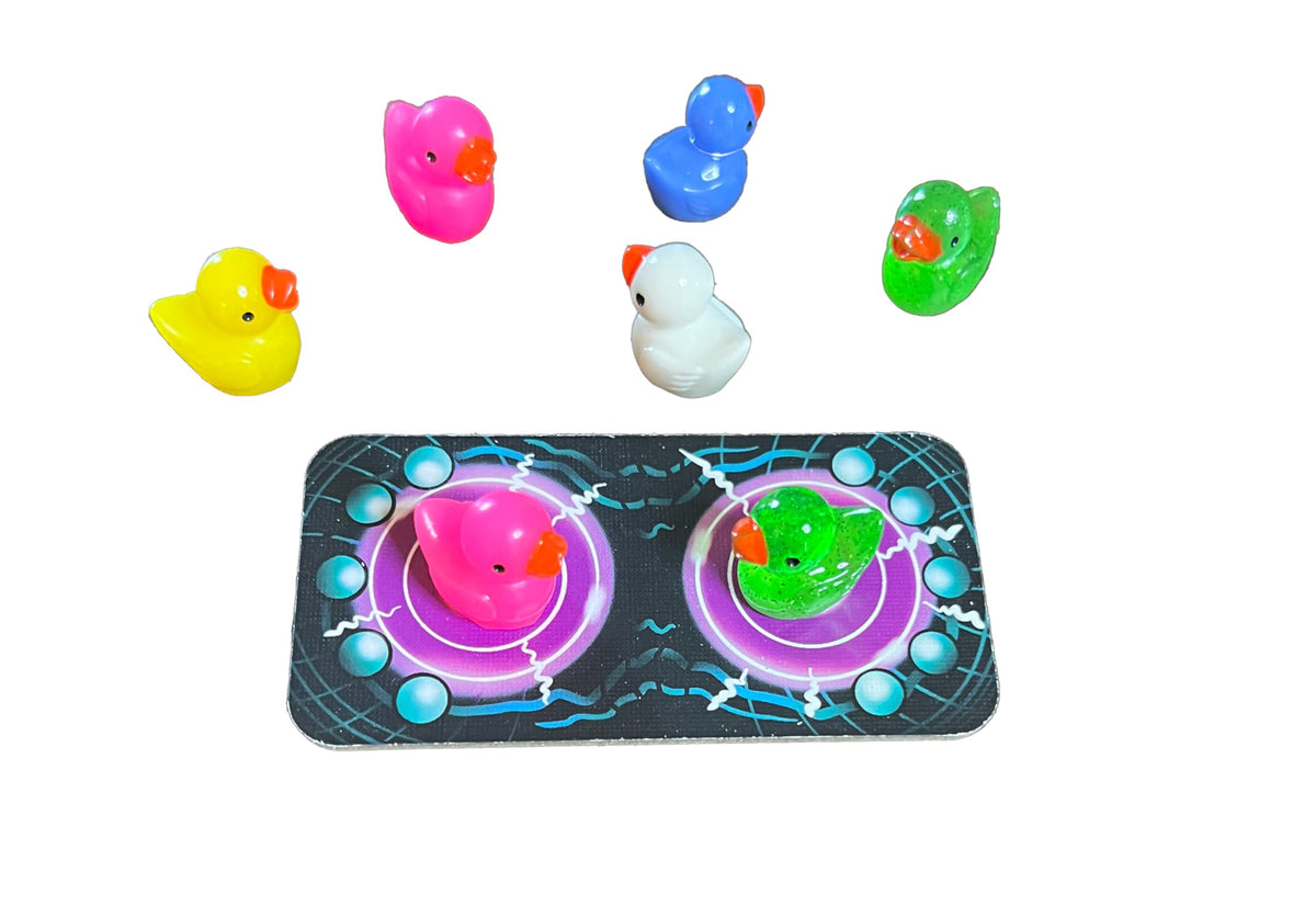 Abducktion glitter ducks add sparkling power-ups and festive table presence.