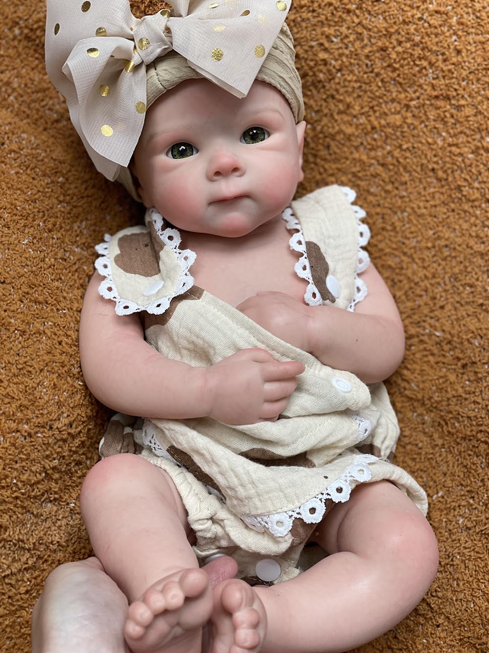 Close up of rosy cheeks and hand painted details on Abenduot Bettie Girl