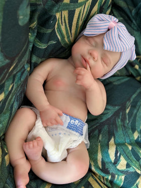 Abenduot Pascale full body silicone doll with lifelike skin and poseable limbs.