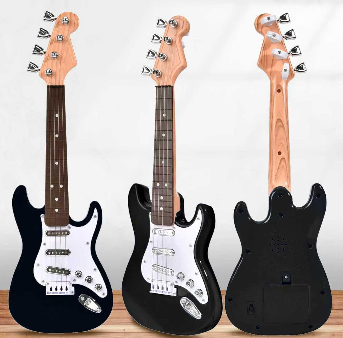 Abundant Financial Resources mini guitar 16-inch strings closeup shows four strings for budding musicians.