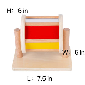 Adena Montessori baby exploring knob puzzle with mirror for self-awareness moments.