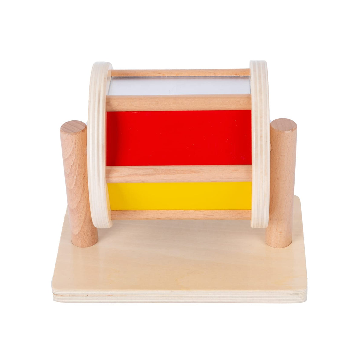 Adena Montessori hand-eye coordination during play as baby spins the drum.