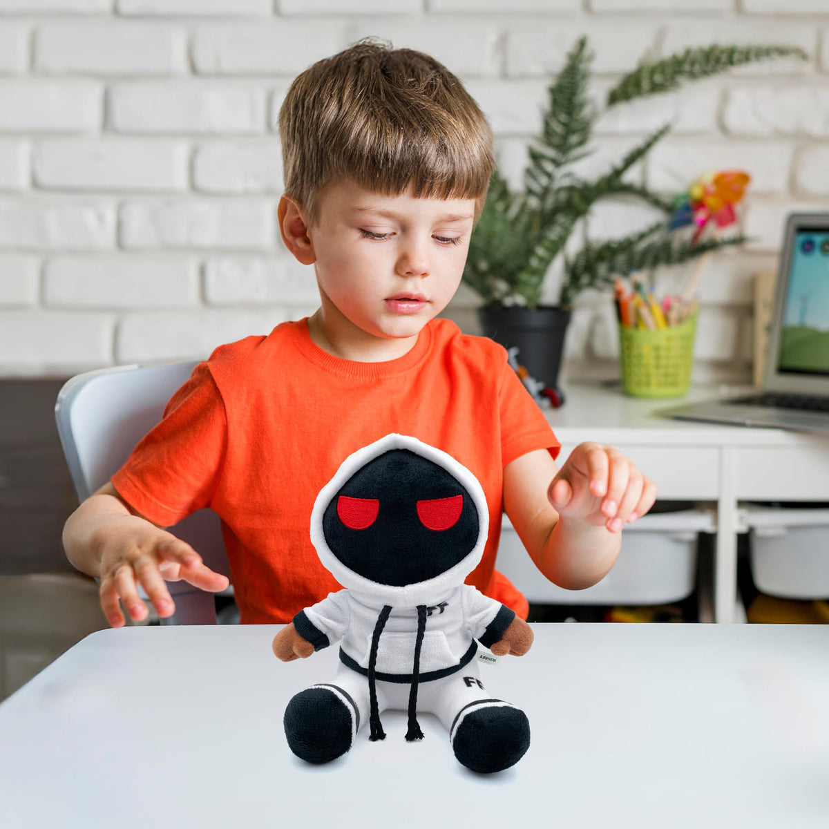 Child hugs an Adenzai Foltyn plushie for cozy bedtime companion