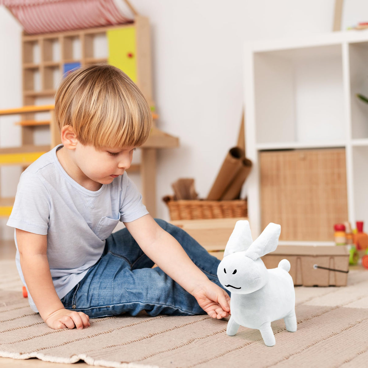 Adenzai Gubby Rabbit plush on gaming setup enhances decor.
