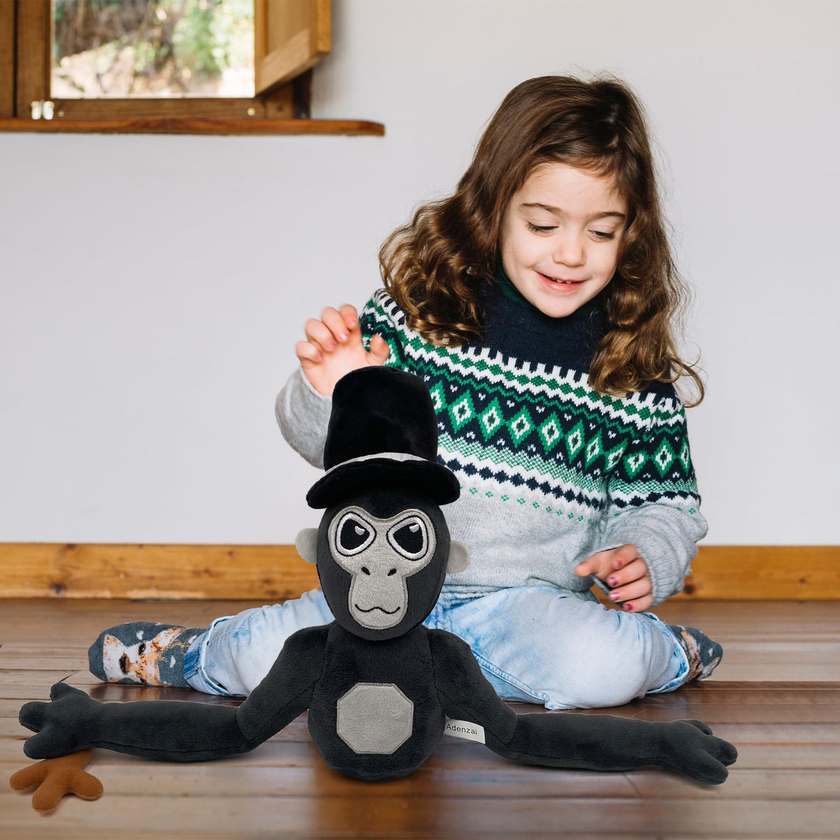 Adenzai Monkey Monkey Plush fabric close-up shows soft material.