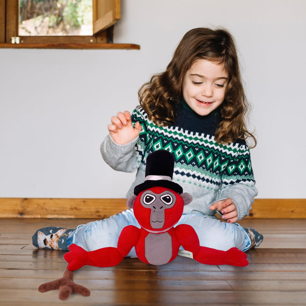Adenzai Monkey Monkey Plush red lightweight material for easy handling.