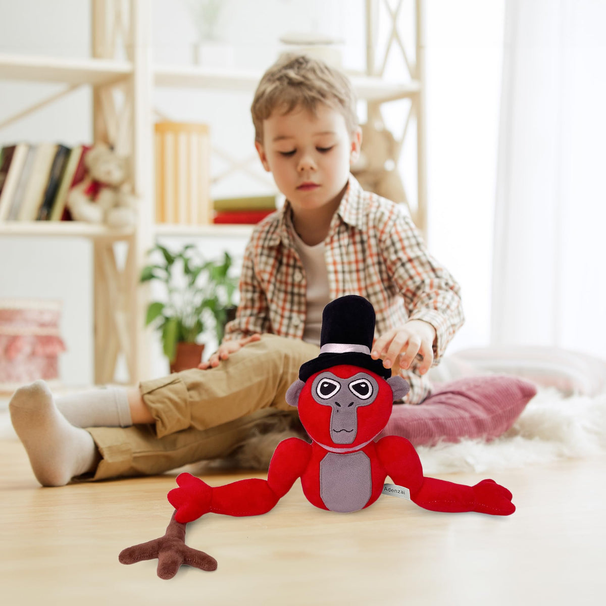 Adenzai Monkey Monkey Plush red with two soft hats.