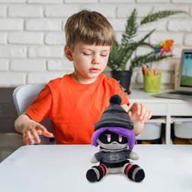 Adenzai Uzi plush on a shelf display as a collectible character.