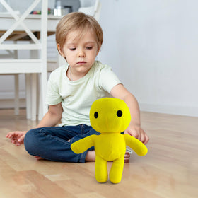Adenzai Yellow Man plush in a playful pose ready for hugs
