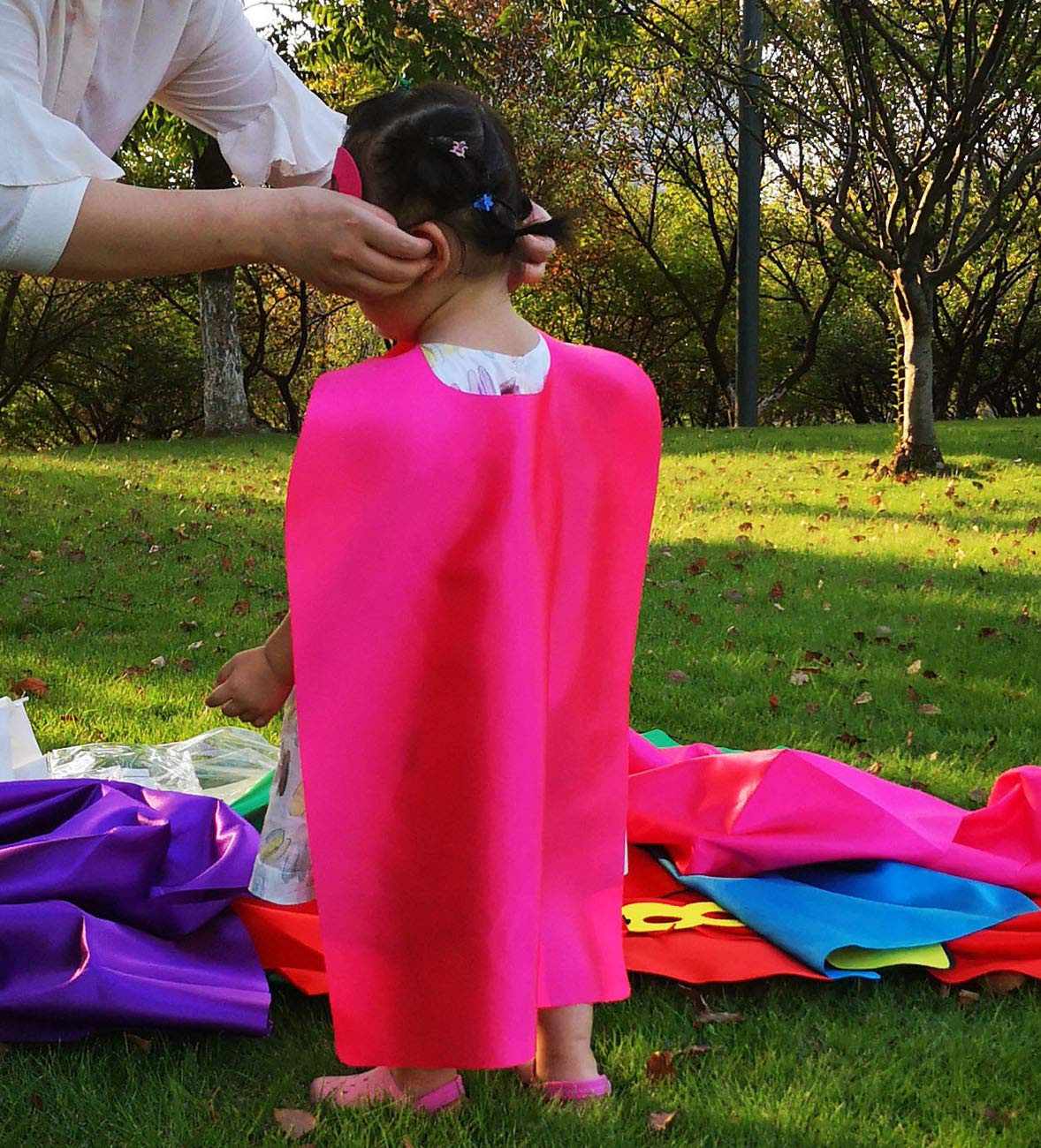 ADJOY cape closure detail with round-neck design for easy wear