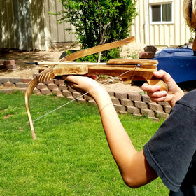 Adventure Awaits crossbow with ten arrows for complete pretend archery fun.