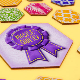 AEG Calico game box art inviting family game night with award-winning design