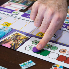 AEG Let's Go! to Japan player pieces and markers, adding tactile fun to planning.
