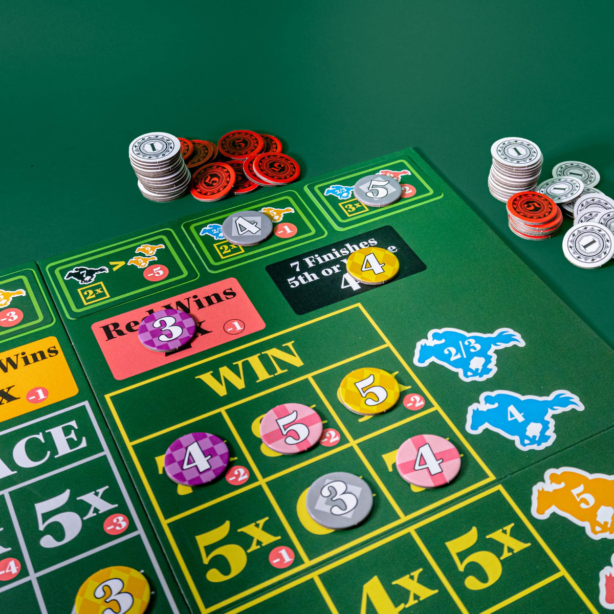 AEG Ready Set Bet chips and pawns set the betting vibe.
