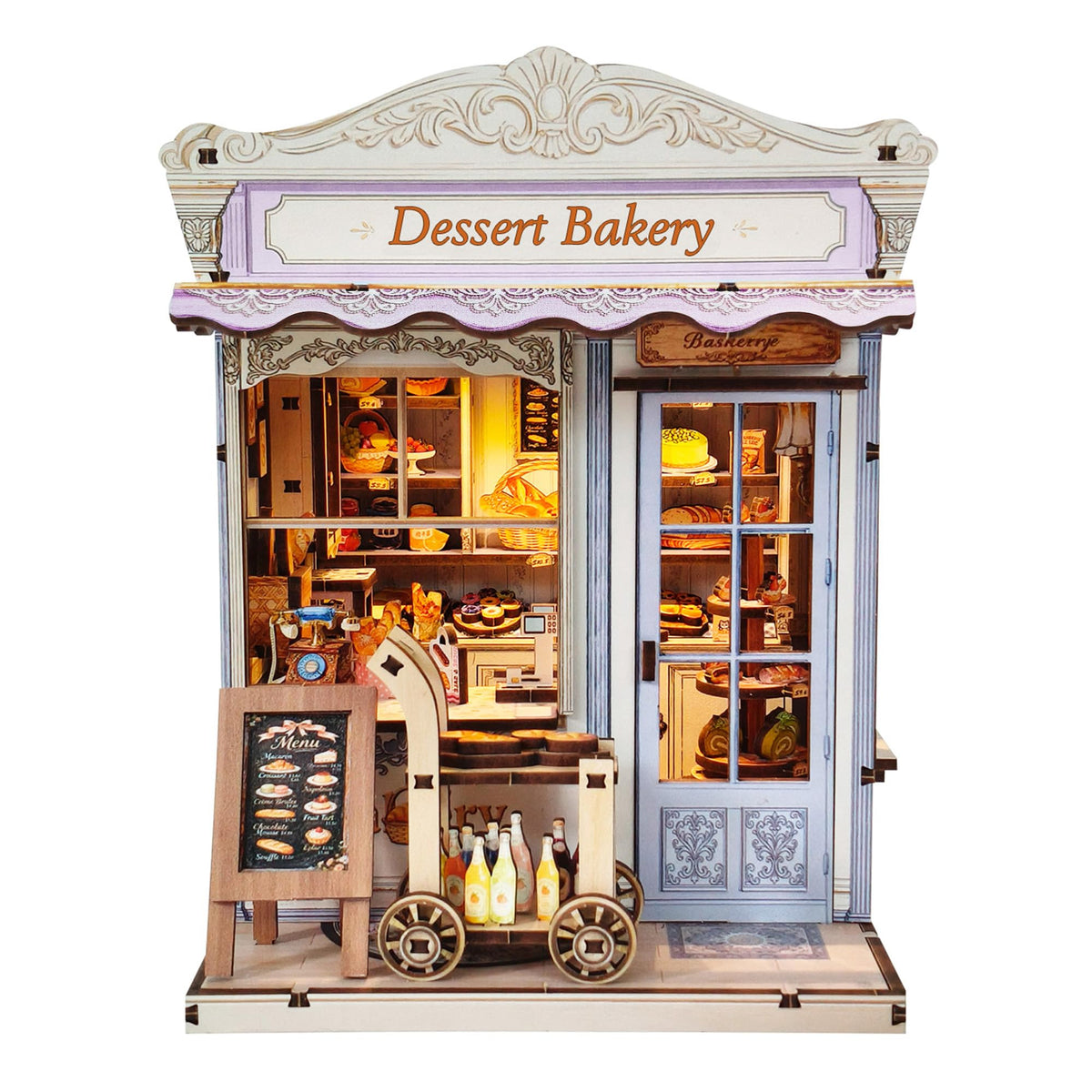 Aeneovix Book Nook Kit assembly view with pastries for hands-on crafting.