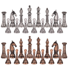 Agirlgle retro metal chess set pieces with bronze and silver finish.