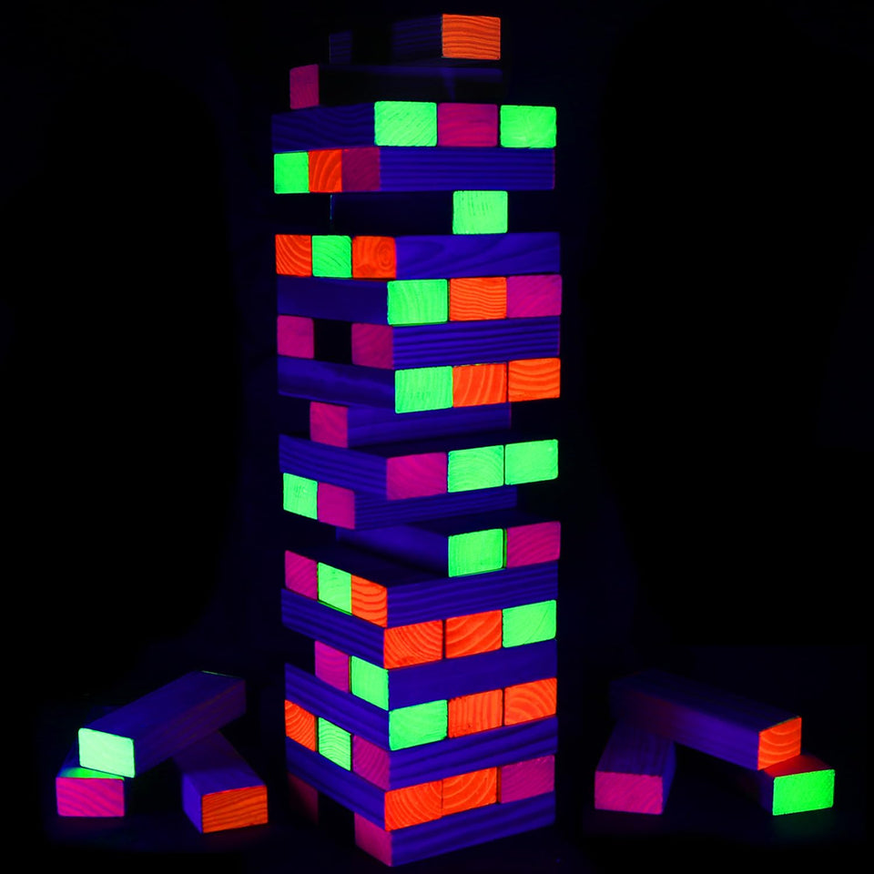 Ahuimeius giant tumble tower blocks glow under blacklight for dramatic outdoor play.