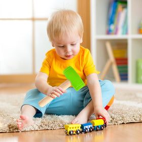 AIHSUMC safety note emphasizing supervision for small parts during play.