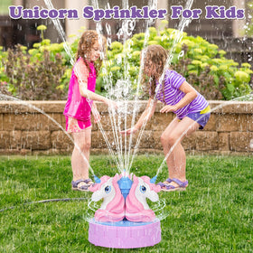 Airyard Unicorn sprinkler spraying water from rotating spouts for outdoor play.