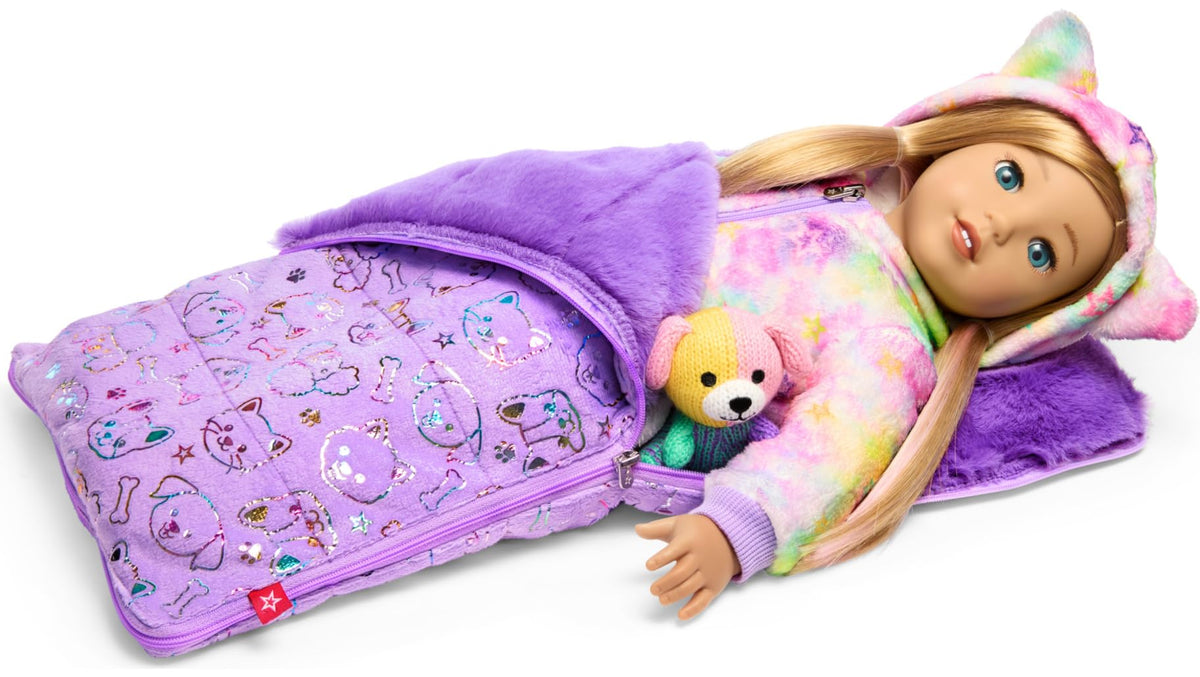 American Girl Summer knit dog, a gift from Aunt Olivia, adds family charm to play.