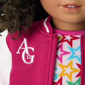 American Girl Truly Me star-print tee on 18-inch doll, vibrant color coordination.