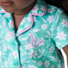 American Girl Truly Me pink furry slippers provide soft footing for indoor play.