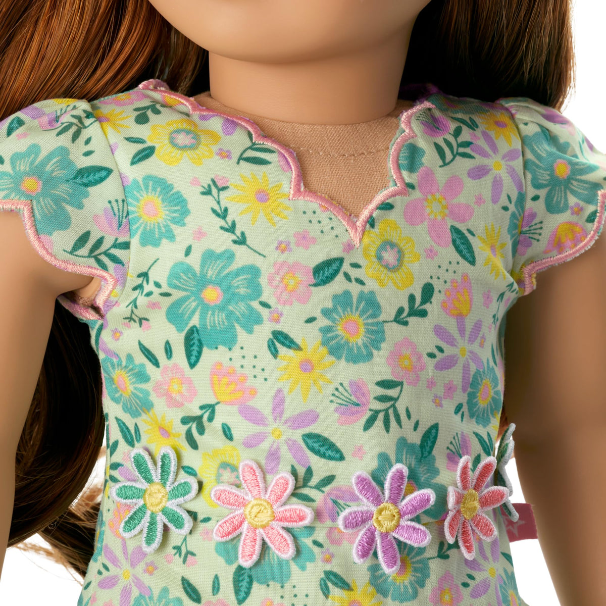 American Girl Truly Me dress shows embroidery and appliques for colorful play outfits.
