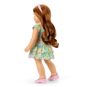 American Girl Truly Me shimmery pink flats complete the outfit.