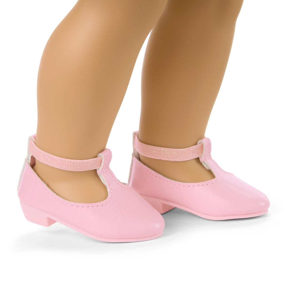American Girl Truly Me light-pink headband complements pastel petals look.
