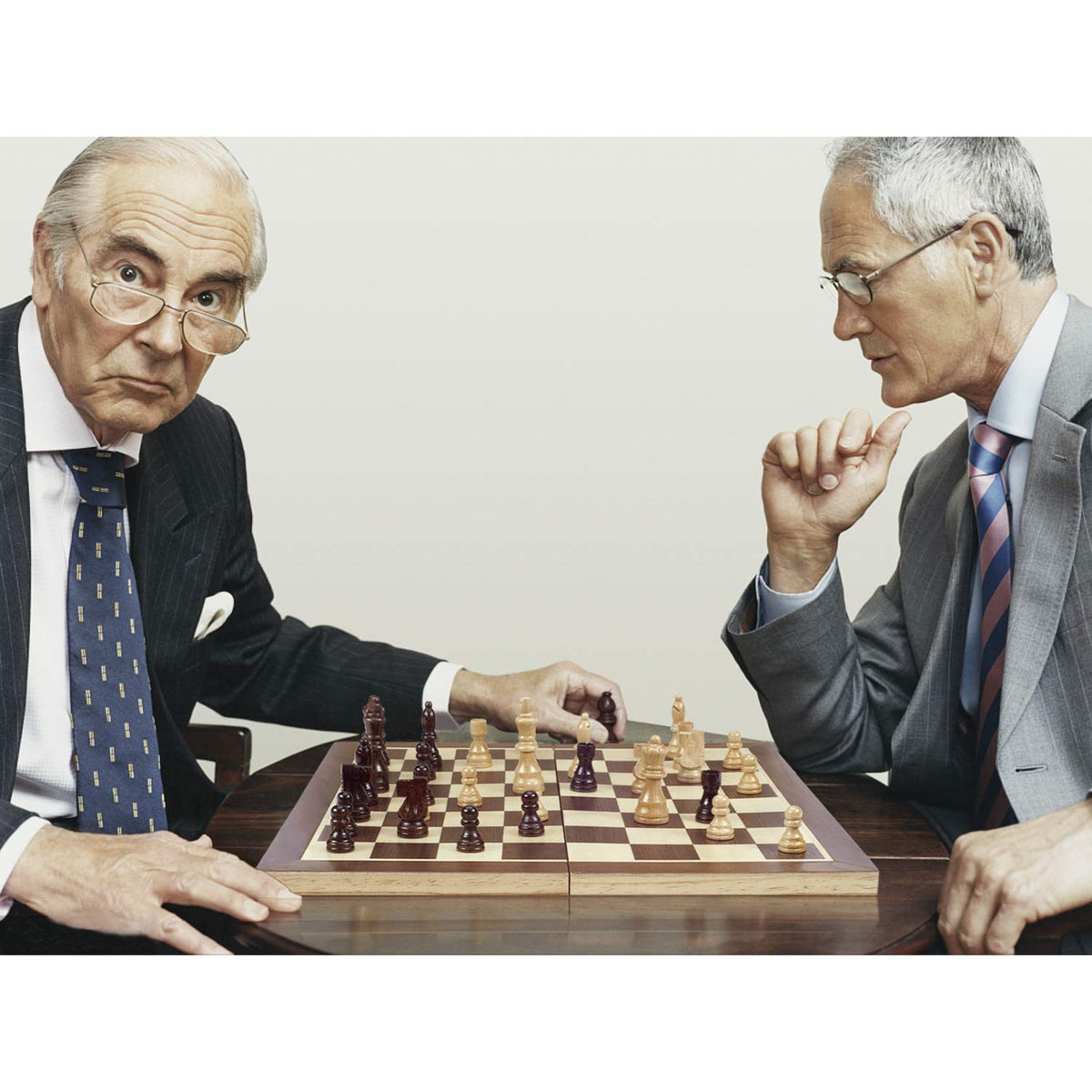 AMERO-US compact travel chess set ready for on the go games.