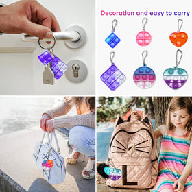amicbng colorful silicone pop keychain ready for party favors and desk play.