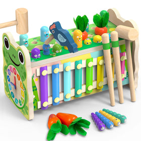Amtreen mole-tapping wooden toy showing hand-eye coordination in action.