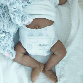 Anano biracial doll wearing soft outfit, ideal for gentle nurture and storytelling.