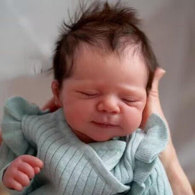 Anano Reborn 18-inch doll arrives with birth certificate and outfit included.