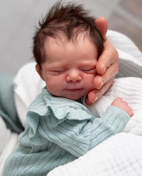 Anano Reborn 18-inch doll with hand-rooted hair ideal for realistic styling sessions.