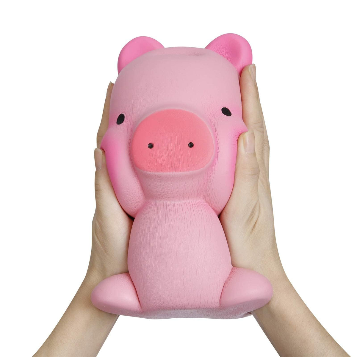 Anboor pig squishies pink color and sizable form for tactile fun.