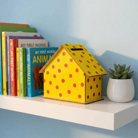 Angoily piggy bank complements kid rooms with playful money-saving prompts