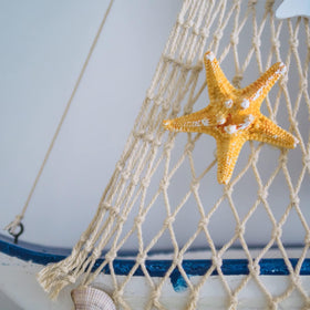 Aodaer beach party setup using natural fishnet decor ideas
