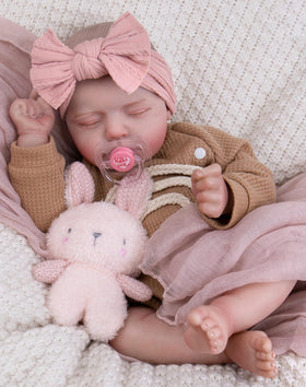 Aori 20-inch reborn baby doll face close-up with lifelike features for nurturing play.