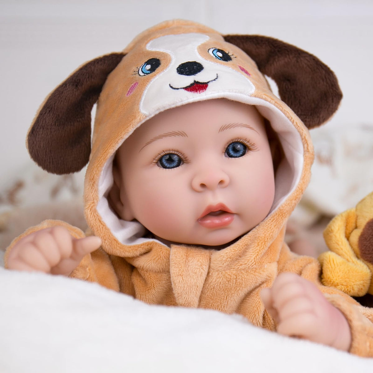Aori baby doll hand-painted details create natural eyelashes and rosy cheeks for immersive play.