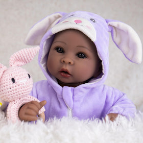 Aori Black Baby Doll 17-inch hand-painted details highlight realistic skin tone.