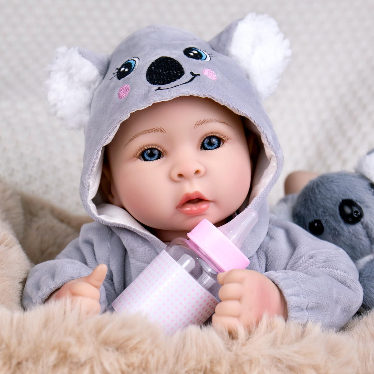 Aori Boy doll feeding kit included for realistic mealtime role play