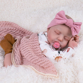 Aori lifelike baby doll in rainbow clothes ready for imaginative play