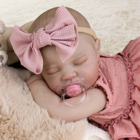 Aori pacifier bottle and birth certificate accessories encourage interactive care.