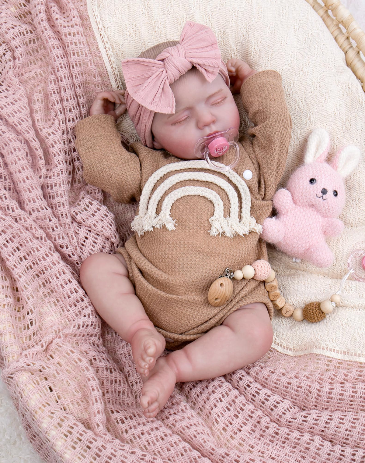 Aori reborn baby doll close-up showing weighted body for lifelike cuddling