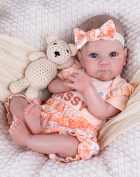 Aori Reborn 20-inch baby doll with movable head and limbs for lifelike play.